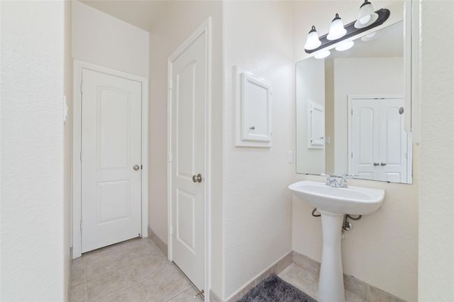 Primary bathroom with double closets, double sinks, and an oversized shower. | Image 25