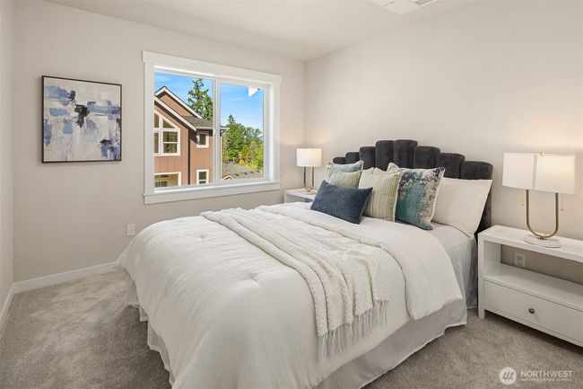 Spacious Bedroom 1 tucked away on the third floor for added privacy. | Image 31
