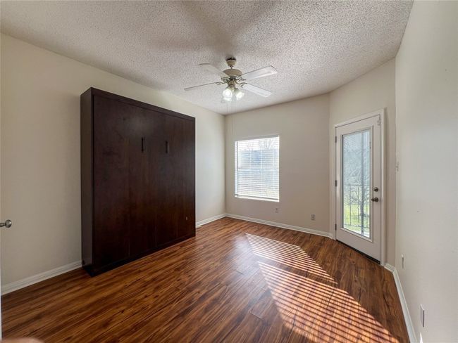 Primary bedroom with a door to the large patio space! | Image 4