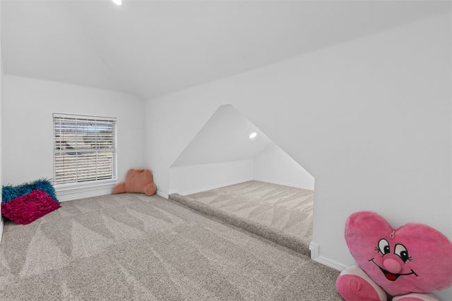 Bedroom with vaulted ceiling, carpet floors, and recessed lighting | Image 15