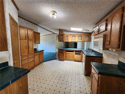 6340 Rocky Fork Road, House other with 4 bedrooms, 2 bathrooms and null parking in Charleston WV | Image 3