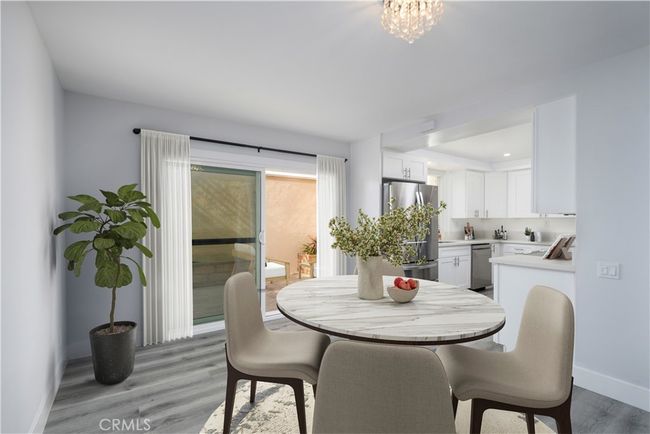 Virtually staged dining room, open to kitchen and living room! | Image 6