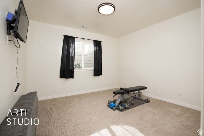 Exercise area featuring carpet flooring | Image 36