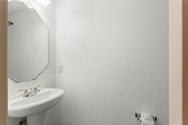 Half bath- 1st floor between Kitchen and Formal Dining Room | Image 22