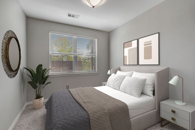 The great natural light in this secondary bedroom helps make this condo comfortable for a roommate situation, an office or a family setup. This photo is virtually staged. | Image 11