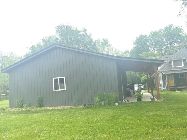 looking towards the house on the south side of the garage | Image 35