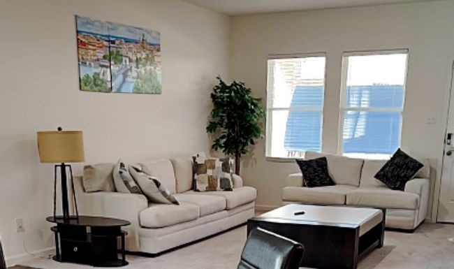 Living room with light colored carpet | Image 10