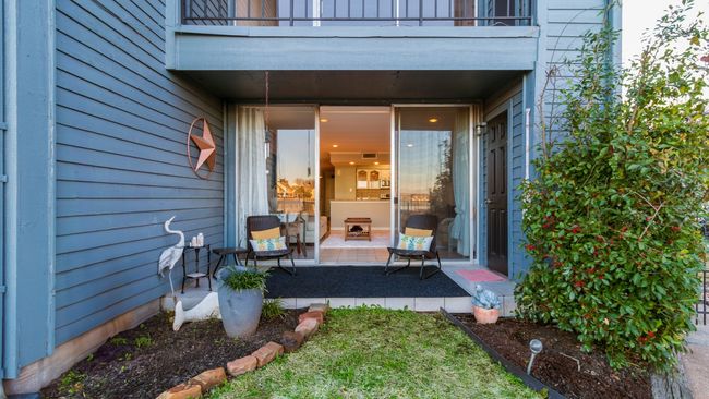 Covered patio with small storage closet | Image 17