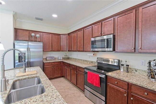 10546 Medjool Drive, House other with 4 bedrooms, 3 bathrooms and null parking in Venice FL | Image 5
