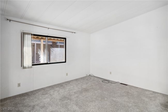 Living room with carpet | Image 8