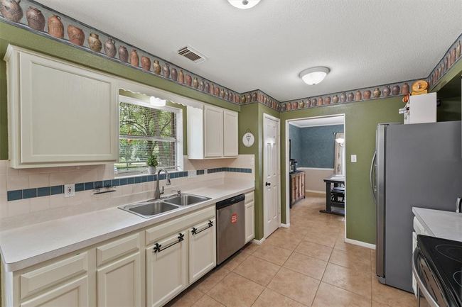 17010 Cypress Knee Dr, House other with 3 bedrooms, 2 bathrooms and 2 parking in Cypress TX | Image 9
