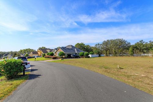 1004 Myrtle Breezes Ct, Fruitland Park, FL, 34731-6547 | Card Image