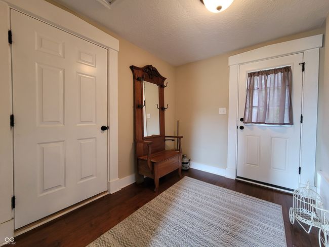 Mud room leads to patio and garage. | Image 39