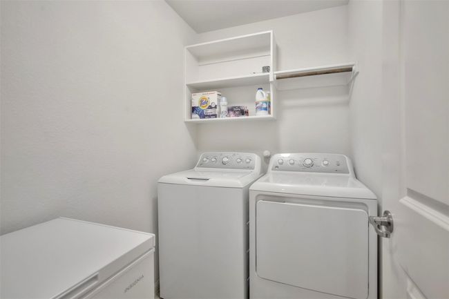 Washroom with separate washer and dryer | Image 23