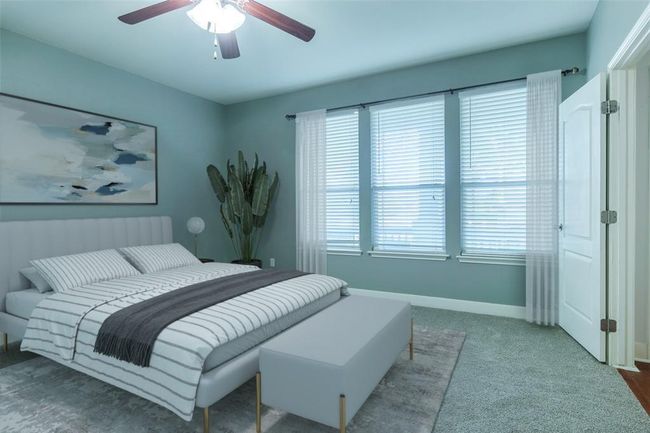 Carpeted bedroom with baseboards and ceiling fan | Image 38