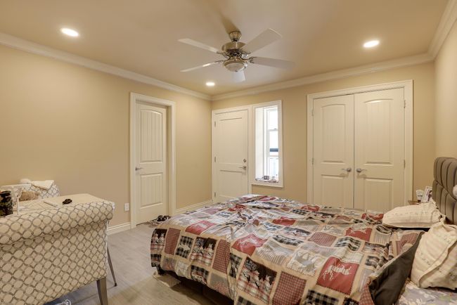 Bedroom with recessed lighting, light wood-style floors, a closet, ornamental molding, and baseboards | Image 20
