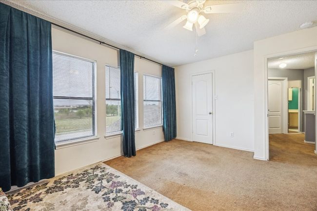 2nd bedroom with water view | Image 10