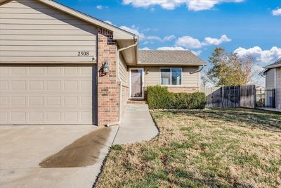 Exterior space with a garage and a lawn | Image 3