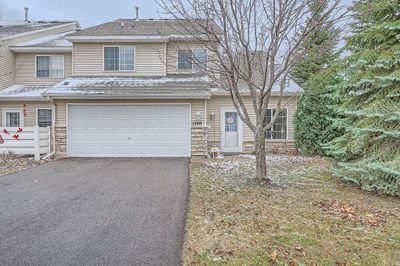 The exterior front entry! You will love this end-unit within this well cared for association! | Image 2