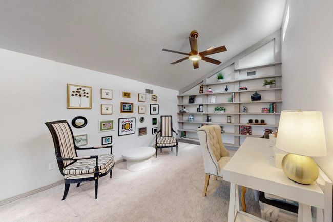Lofted space with builtin shelving - great for office, gym or even a 4th bedroom! | Image 30