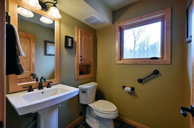 There is a convenient powder room on the main floor. | Image 44