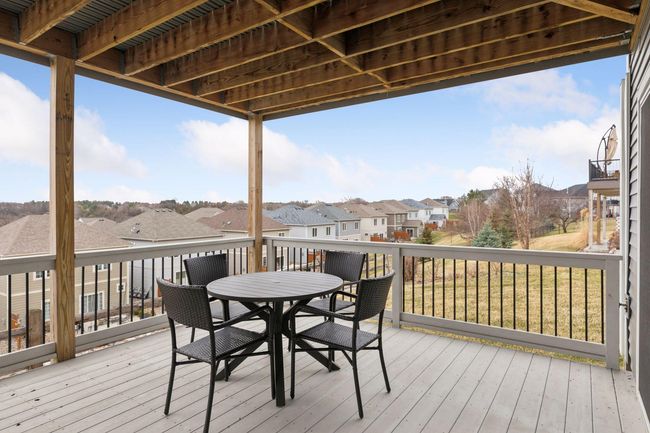 Lower Level Deck is also a wonderful space to take in the outdoor view or access the yard | Image 51