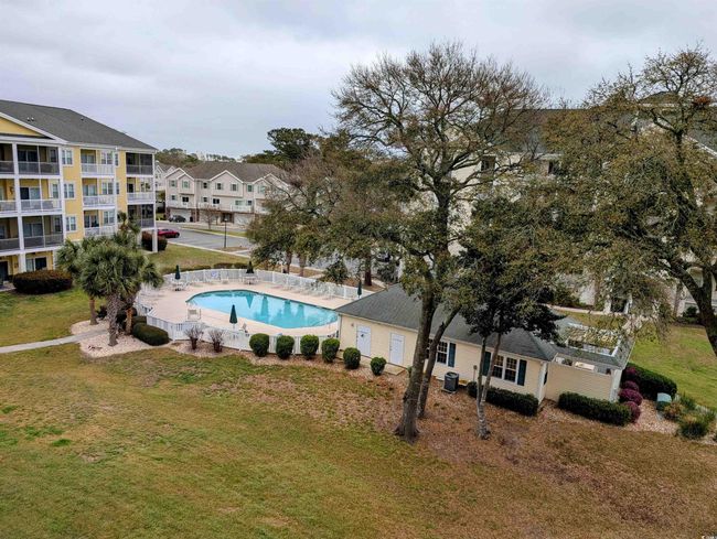 Pool featuring fence and a yard | Image 20