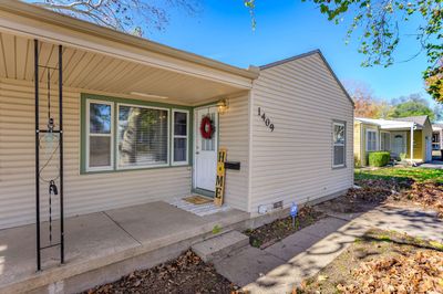 Doorway to property with a porch | Image 3