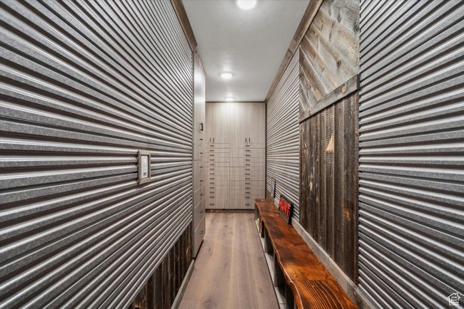 Corridor with wooden walls and wood finished floors | Image 44