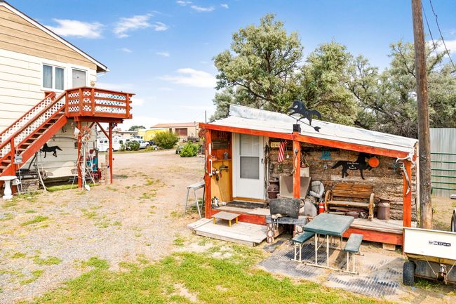 View of yard featuring an outdoor structure | Image 13