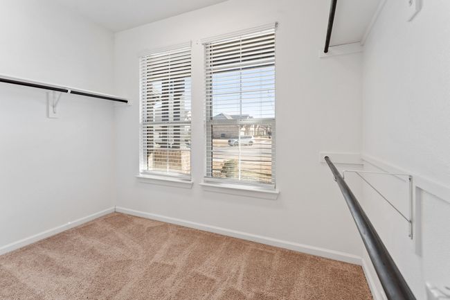 Spacious closet with carpet | Image 13