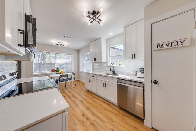 Kitchen with Pantry space. | Image 6