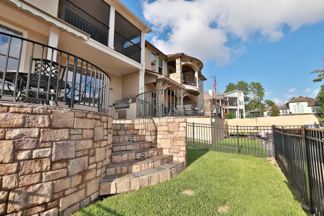 Yard space between the patio, and dock | Image 39