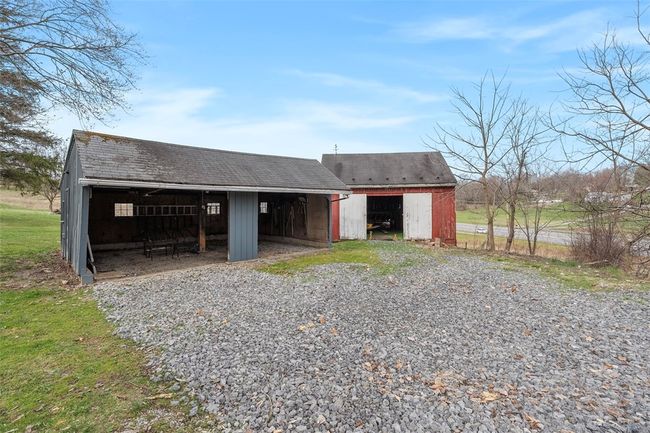The carport and barn are being sold As-Is. | Image 33