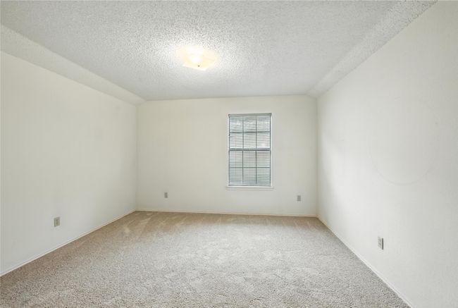 Empty room featuring light colored carpet and a textured ceiling | Image 30