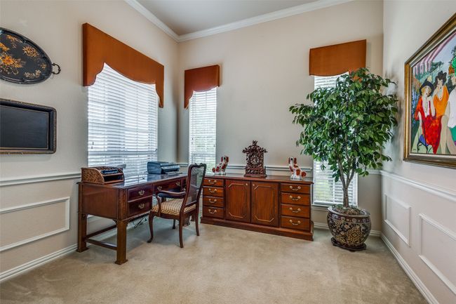 Office area featuring ornamental molding and light carpet | Image 5