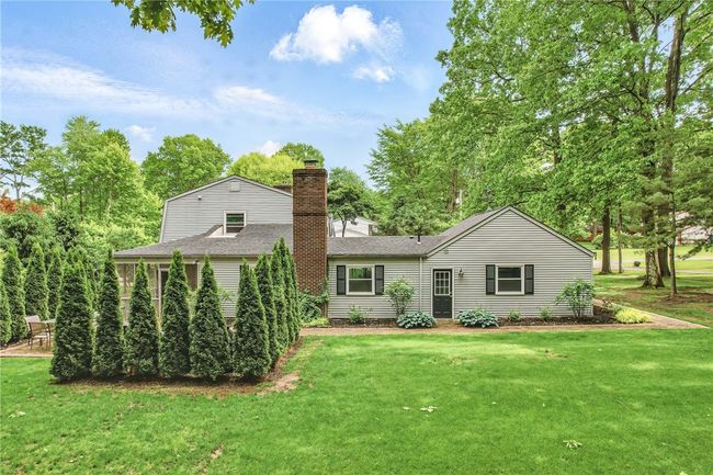 Beautifully maintained property with a spacious yard. | Image 46