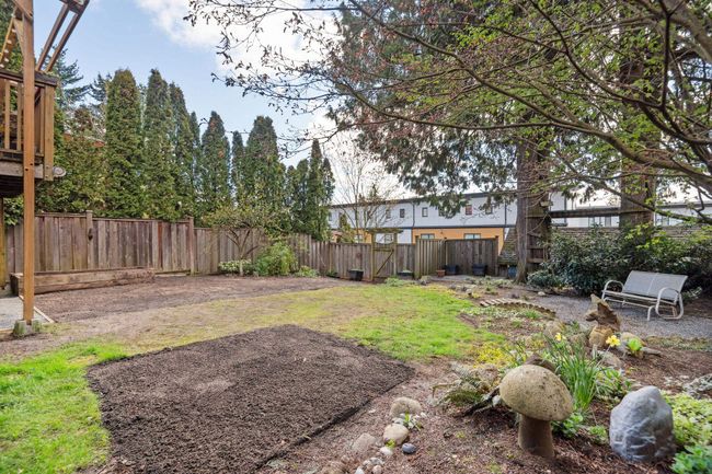 View of yard with a fenced backyard | Image 26