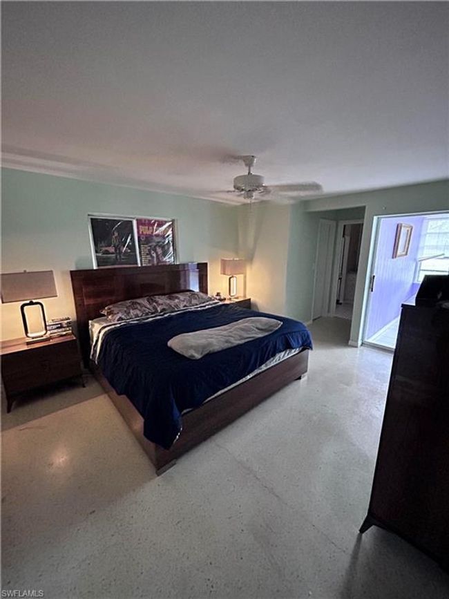 Bedroom featuring ceiling fan | Image 11