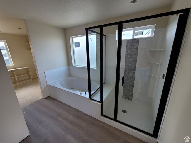 The Principal Ensuite Bathroom features a separate tub and shower. | Image 13