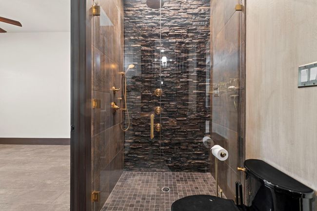 En suite bath that has access from hallway and bedroom, bedroom is to the left | Image 43