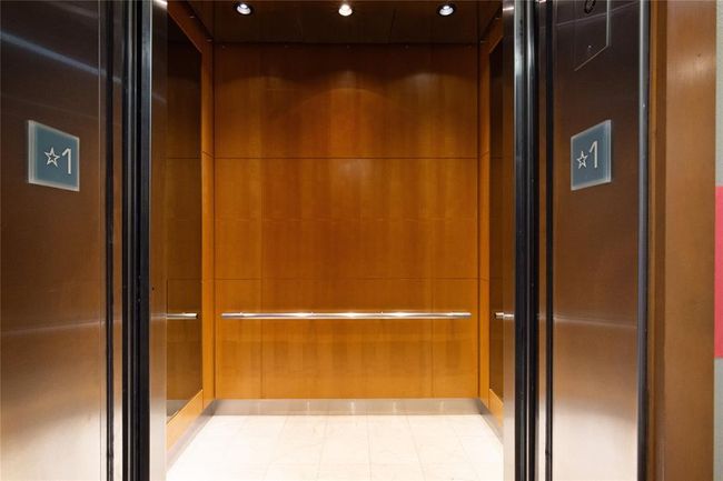 The beautiful elevator not only transports you to your destination but also serves as a prelude to the exquisite Condo that awaits. | Image 33