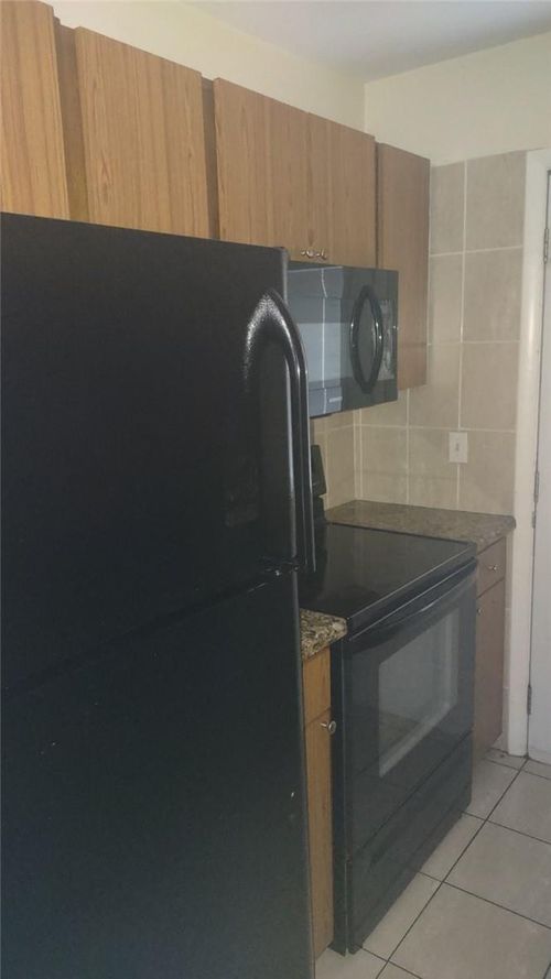 1450 E Sample Rd, Pompano Beach, FL, 33064-6290 | Card Image