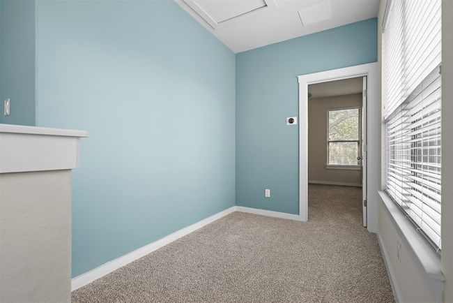 The upstairs loft provides a versatile space, perfect for a cozy reading nook, home office, or play area, offering endless possibilities to suit your needs | Image 24