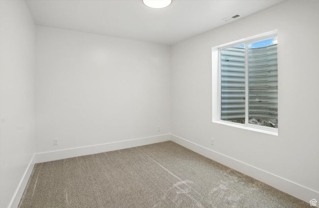 Empty room with carpet flooring | Image 34