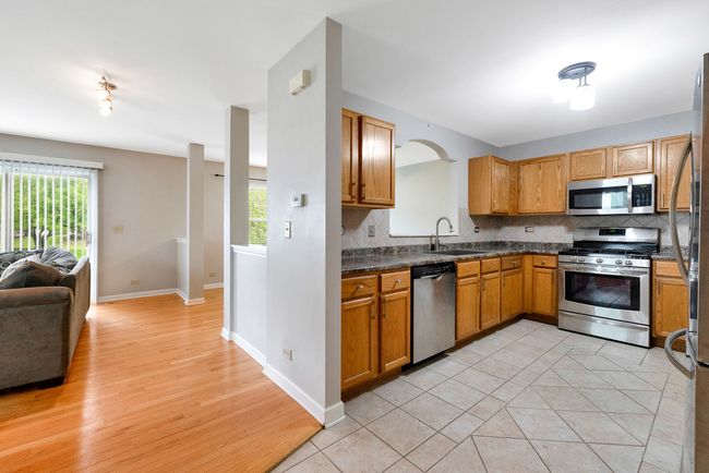 1A - 675 Fieldcrest Dr, Condo with 3 bedrooms, 3 bathrooms and 2 parking in South Elgin IL | Image 6