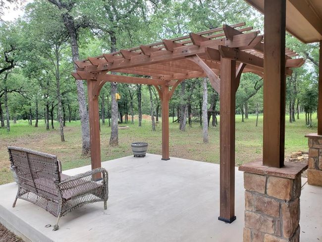 View of patio with a pergola | Image 13
