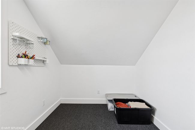 Bonus room with baseboards, vaulted ceiling, and dark colored carpet | Image 35
