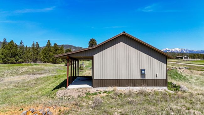View of home's exterior with a mountain view | Image 23