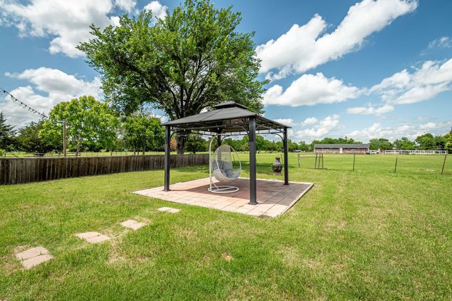 View of yard featuring a gazebo and a patio | Image 4